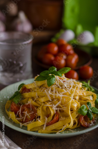 Pasta semolina with tomatoes and parmesan cheese