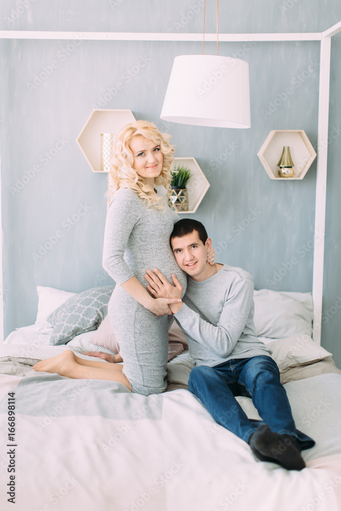 Pregnant girl with her husband