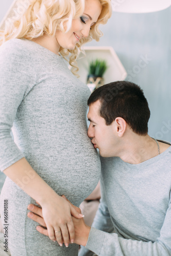 Pregnant girl with her husband