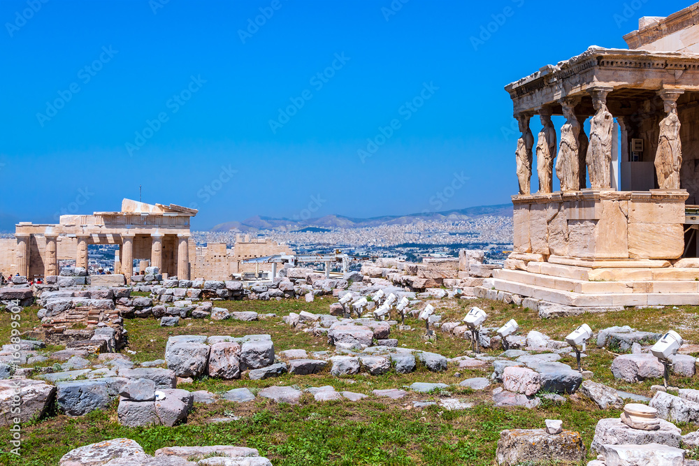 Ancient Acropolis, Erechtheion, view of the north side of the Parthenon with caryatids and Athens, Greece.