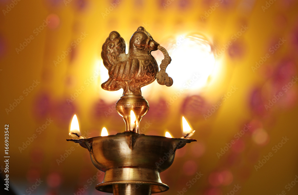 Indian Traditional Oil Lamp with Flame Stock Photo | Adobe Stock