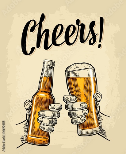 Two hands holding and clinking with beer glasses and bottle