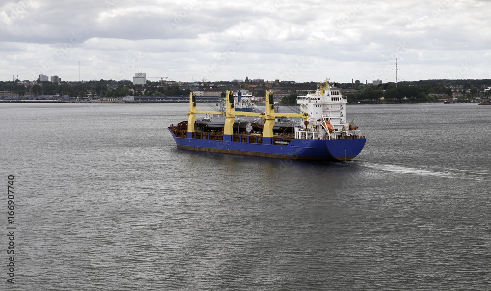 Fototapeta premium cargo ship leaving the Kiel harbor