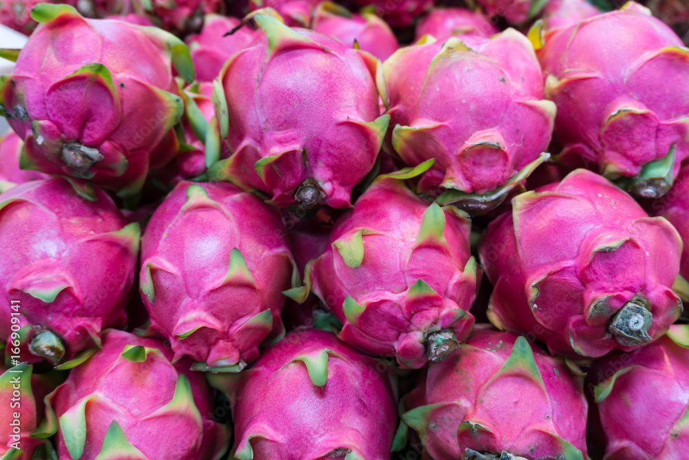 Fresh delicious dragon fruit on market stand at market in Thailand ,healthy fruit concept Fresh delicious dragon fruit on market stand at market in Thailand ,healthy fruit concept