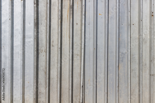 Corrugated metal fence