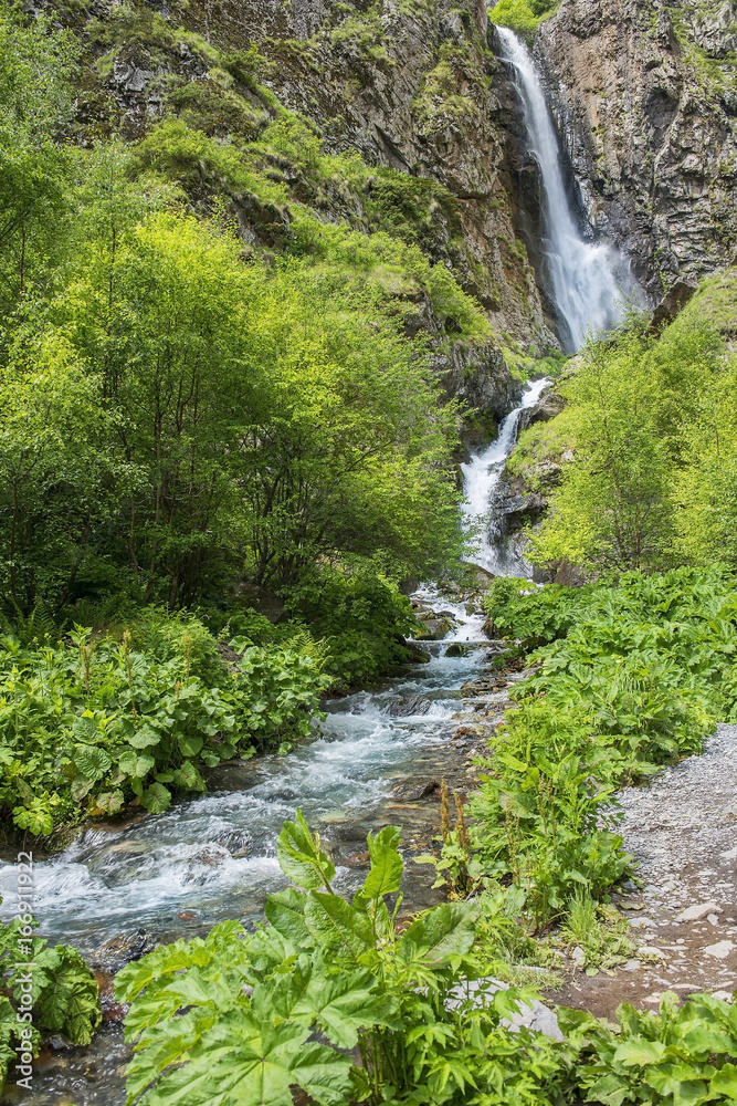 landscape with a waterfall in the Caucasus Mountains, Georgia landscape with a waterfall in the Caucasus Mountains, Georgia