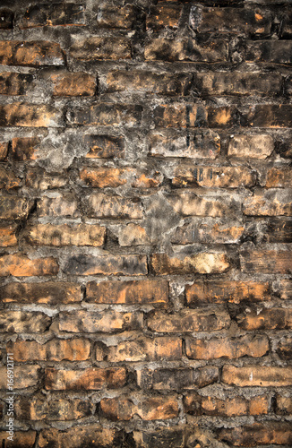 Burned brick wall, amazing textured background