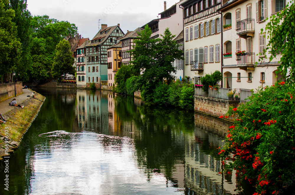 Historic house of La Petite France in Strasbourg reflected in the river, France