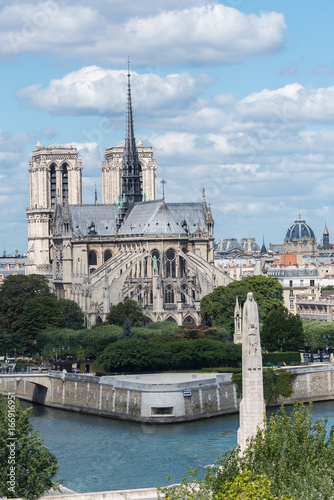 Paris, Notre-Dame cathedral and the statue of ste Genevieve on the Tournelle Bridge 