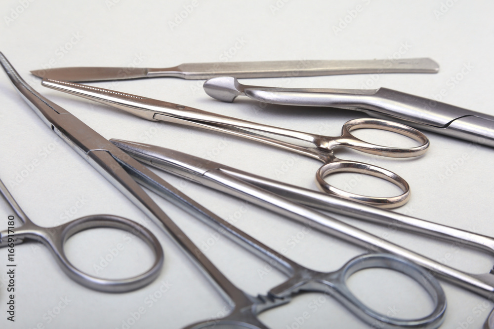 Close Up Surgical instruments and tools on white background. Selective focus.