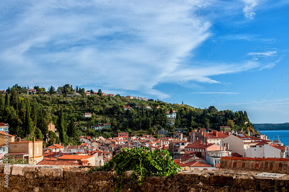 Beautiful view of the city of Piran, Slovenia on a Sunny day with beautiful cloud on the sky. The horizontal frame.