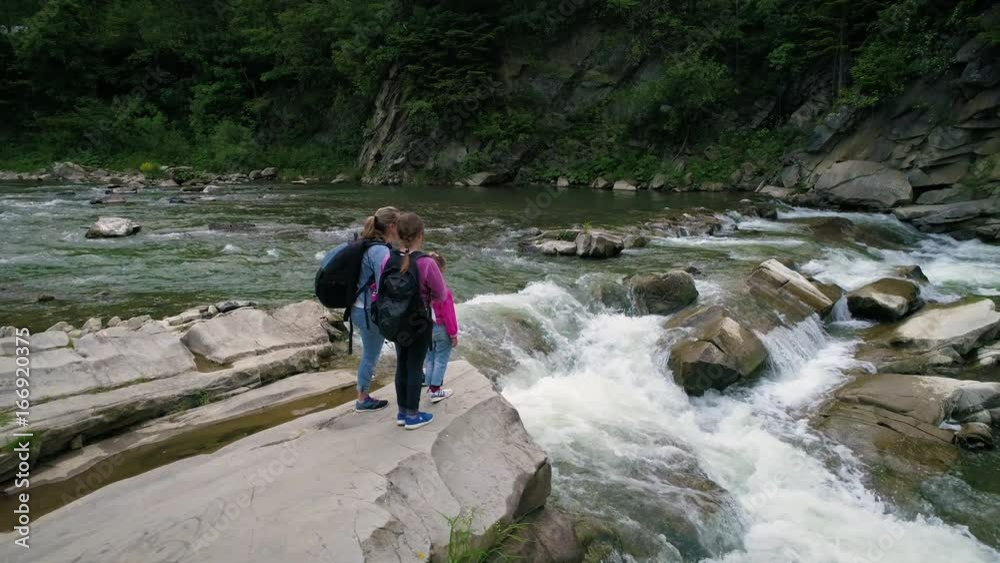 People near beautiful flowing water People near beautiful flowing water