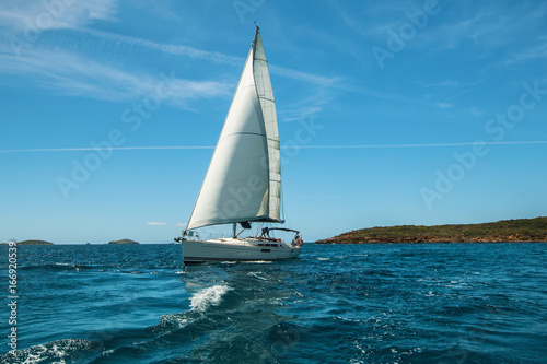 Luxery yacht Sailing on the waves in the Aegean sea.