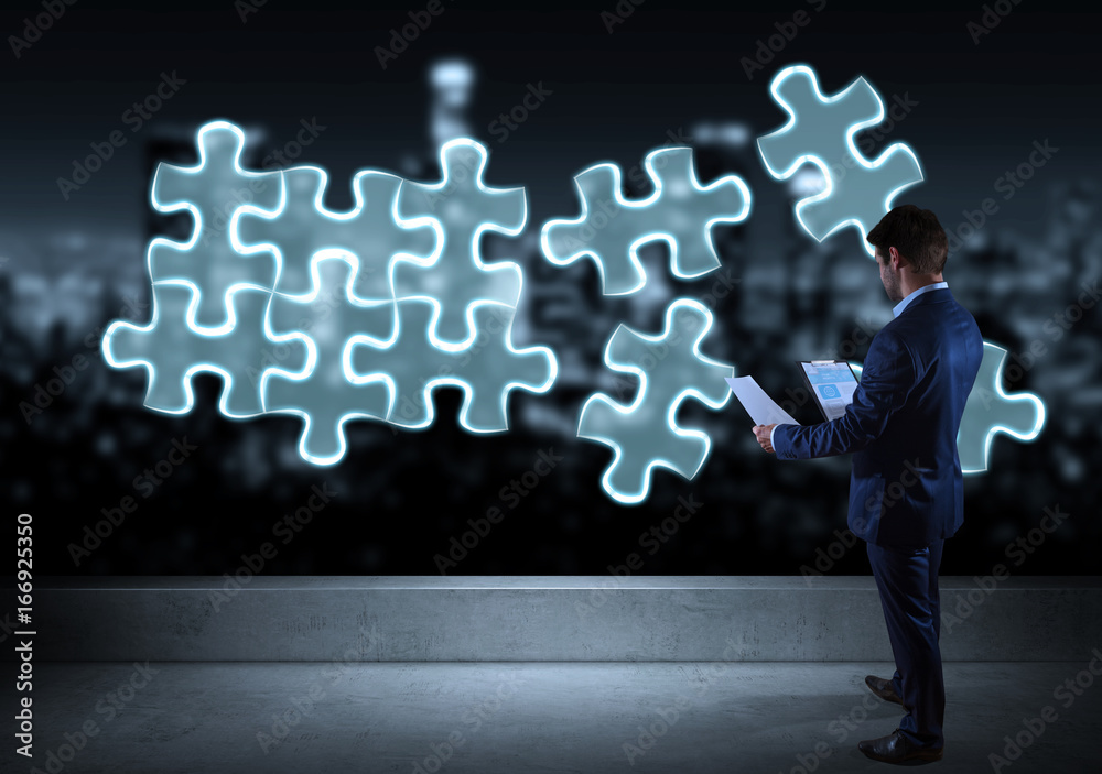 Businessman searching puzzle solution on a rooftop 3D rendering Businessman searching puzzle solution on a rooftop 3D rendering