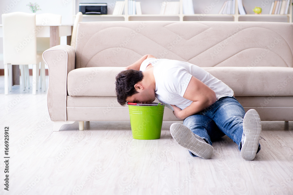 Man suffering from sick stomach and vomiting Man suffering from sick stomach and vomiting