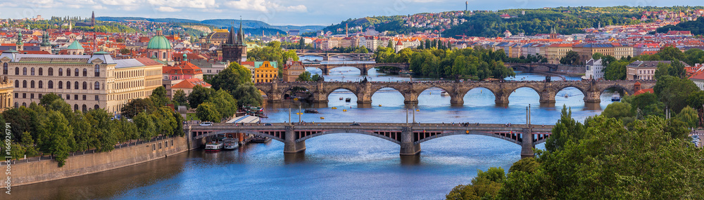 Wide panorama of Prague with river Vltava Charles Bridge and other bridges