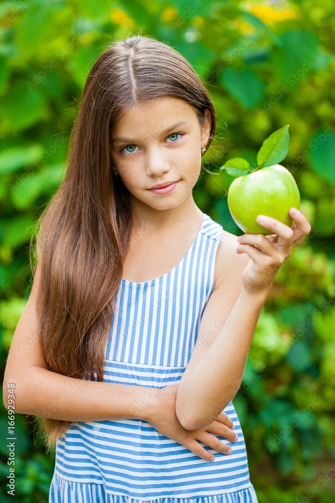 Picture of beautiful girl with green apple Picture of beautiful girl with green apple