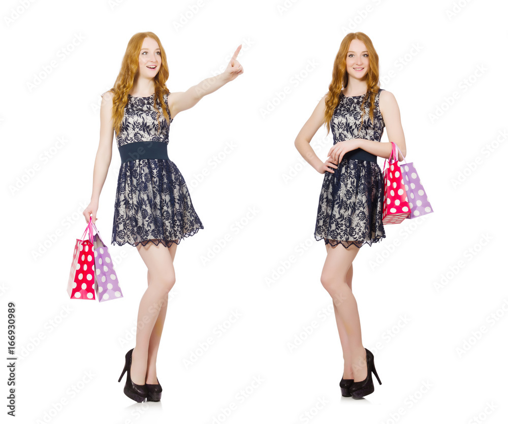 Woman with shopping bags isolated on white Woman with shopping bags isolated on white