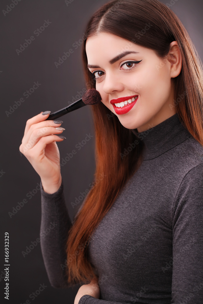 Make-up and cosmetics concept. Asian woman doing her makeup eyelashes dark mascara. Make-up and cosmetics concept. Asian woman doing her makeup eyelashes dark mascara.