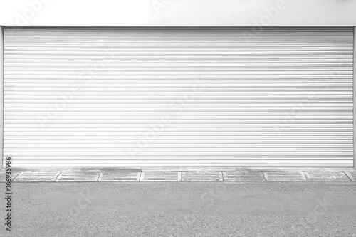 White metal roller door shutter background and texture © torsakarin