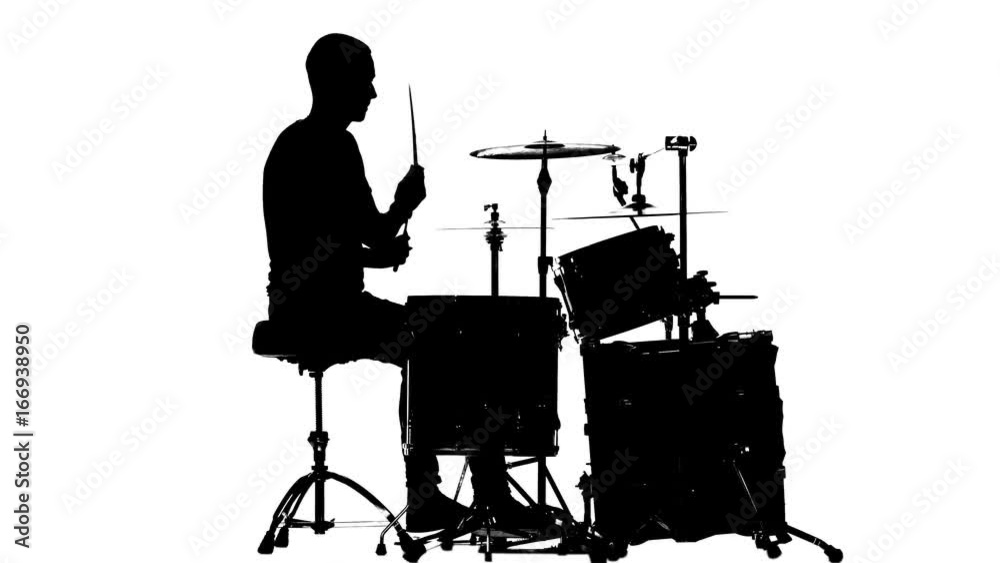 Guy plays the music on the drum. White background. Silhouettes. Side view