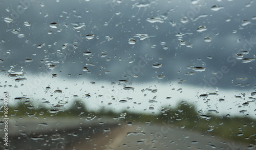 raining drops on car glass