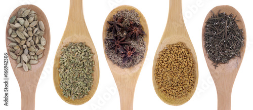 Spice seeds on bamboo spoons