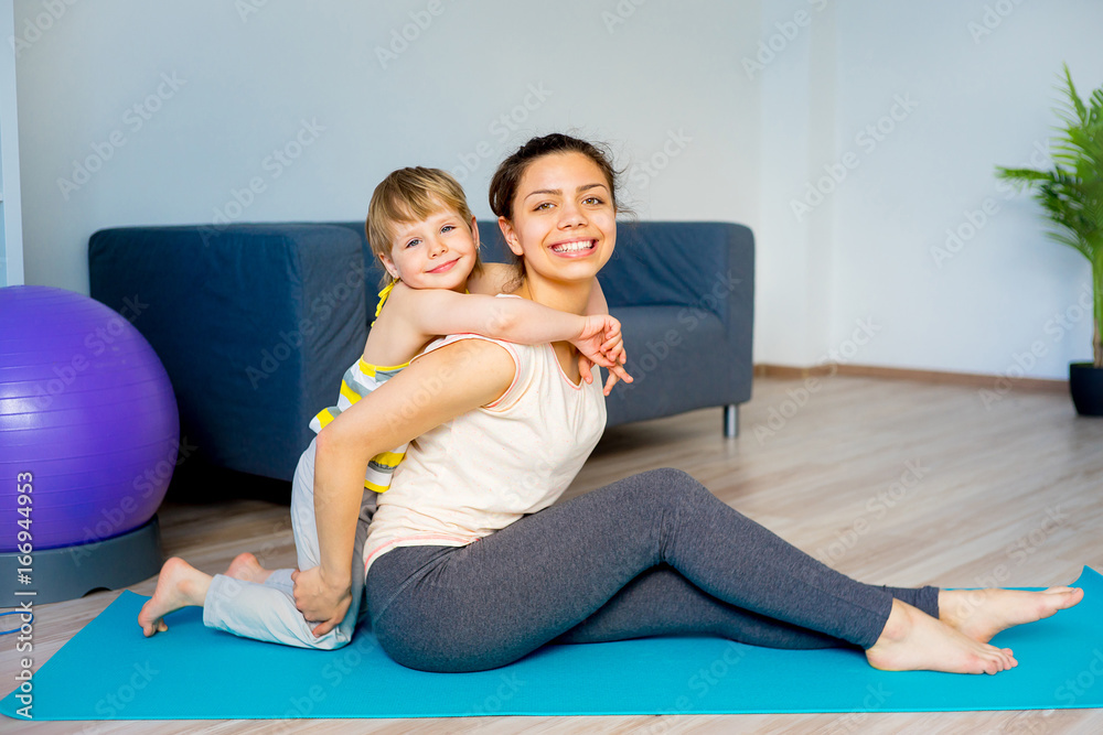 Mother is doing exercises Mother is doing exercises