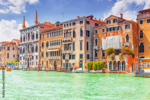 Views of the most beautiful canal of Venice - Grand Canal water streets, boats, gondolas, mansions along. Italy.