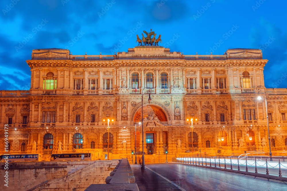 Palace of Justice (Corte Suprema di Cassazione) near Tiber river and Bridge (Ponte) Umberto I. Rome. Italy.