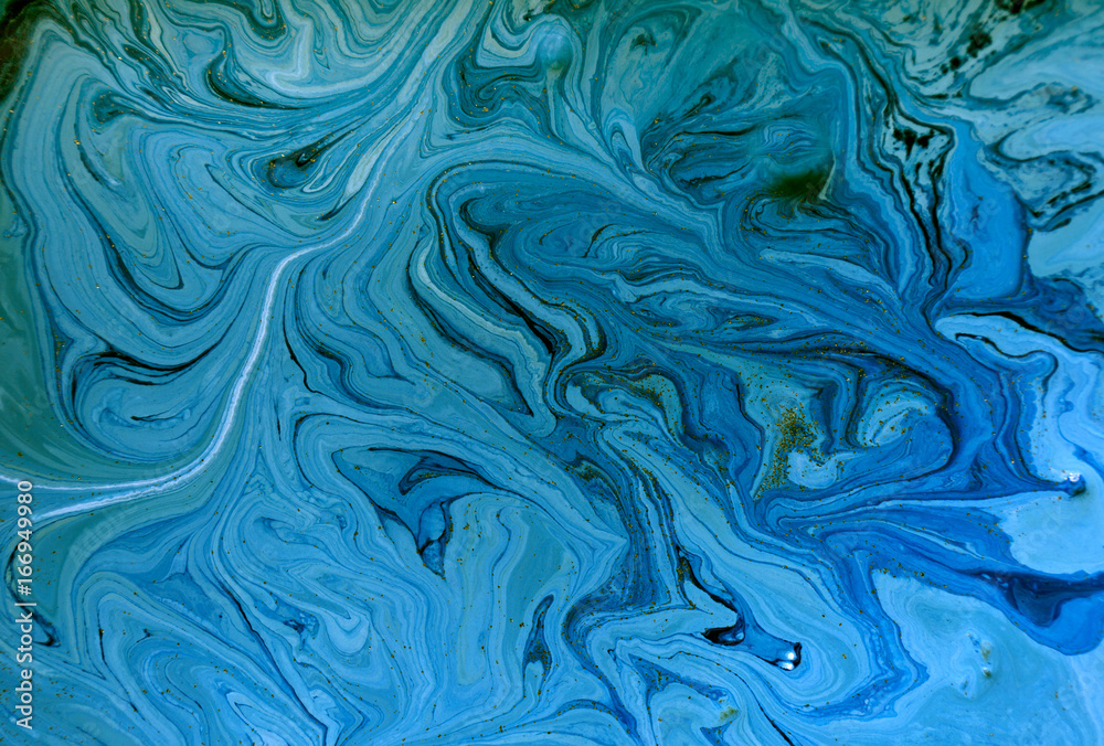Marbled blue and golden abstract background. Liquid marble pattern