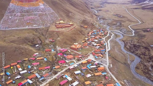 Aerial view of Tibetan Monastery and small village in Kanze, Sichuan, China photo