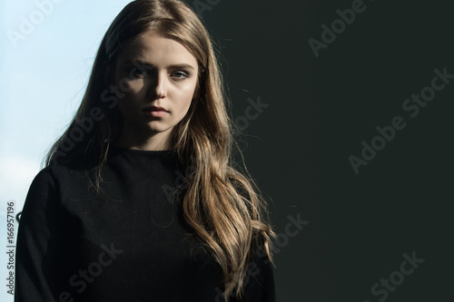Girl in black dress.