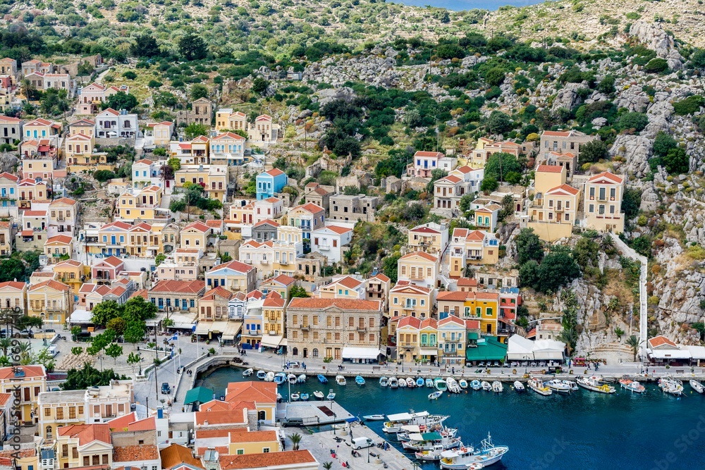 Cityscape of a picturesque Symi town, capital of Symi island, Greece