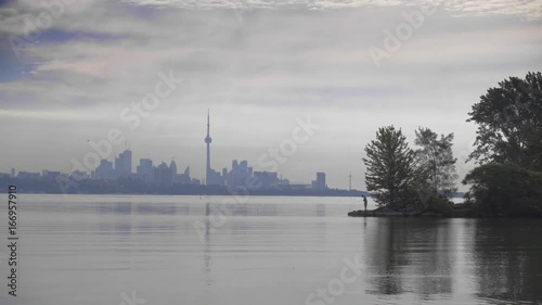 sailboat in summer on the lake ontario toronto fisherman