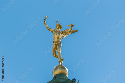 Paris, place de la Bastille, statue of the golden angel, closeup photo