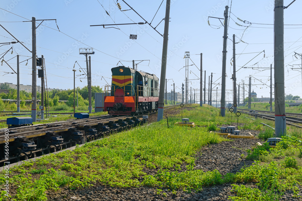 Locomotive at the railway station and infrastructure Locomotive at the railway station and infrastructure