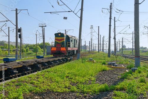 Locomotive at the railway station and infrastructure