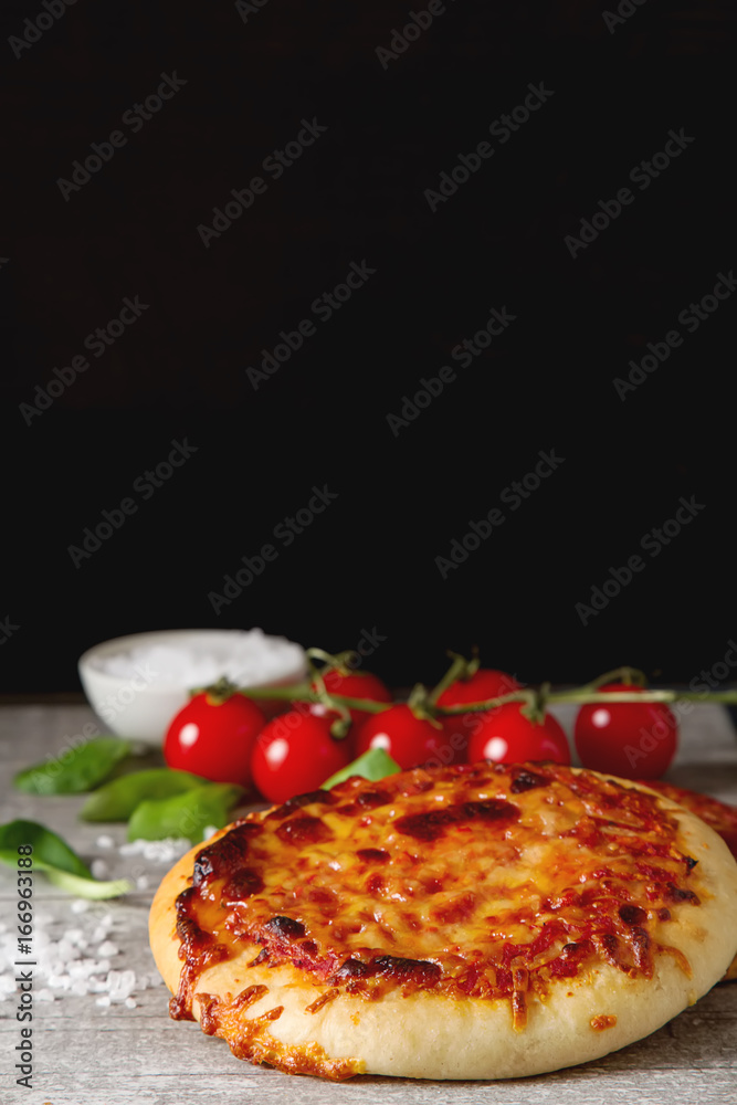 Mini margarita pizza. Italian food. Simple background. Fast food