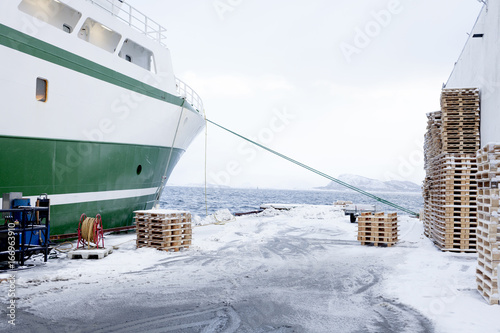A Norwegian fishing boat parked in the port of Ålesund, Norway
