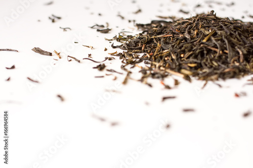 Loose green Chinese tea. White background.