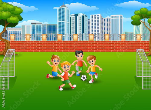 Children playing soccer in the park