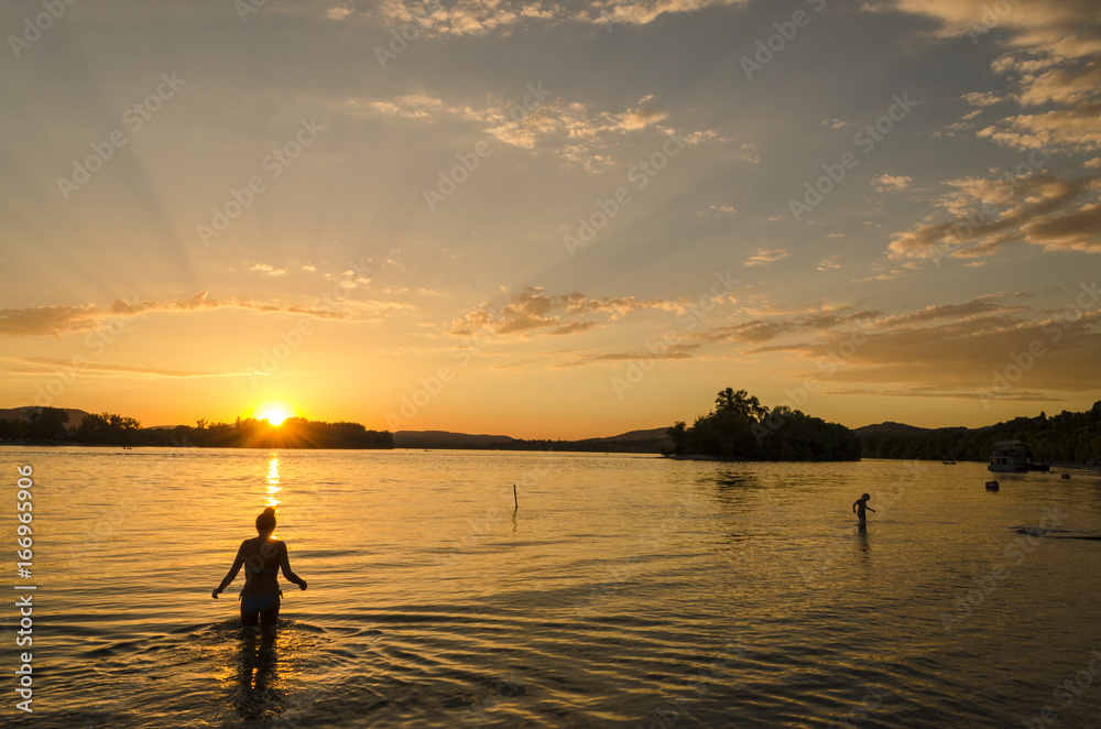 beach sunset by Danube in summer, Hungary. summer beauty sunset in July