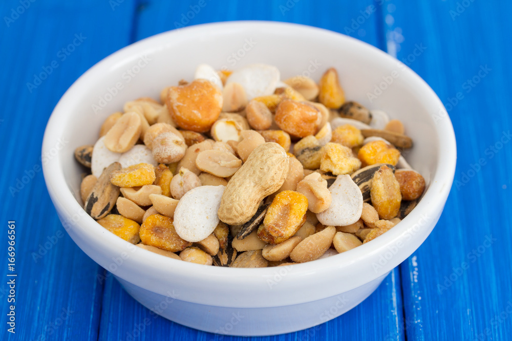 salted nuts and seeds on white dish