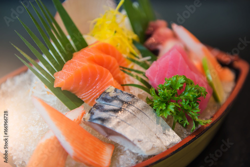 Japanese style food .fresh raw fish mixed ,sashimi . 
