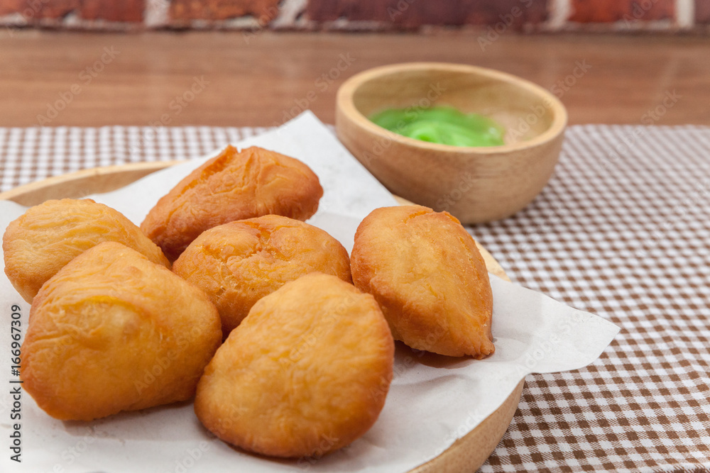 Chinese fried Dough bun with Pandan coconut custard dip Chinese fried Dough bun with Pandan coconut custard dip