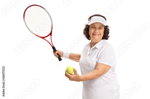 Elderly tennis player preparing to serve © Ljupco Smokovski