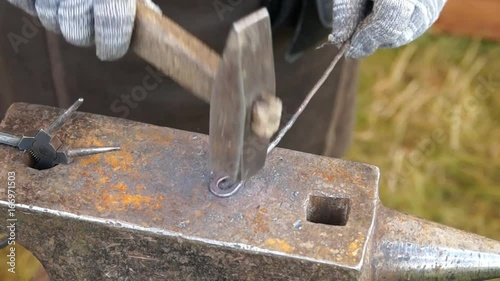 Blacksmith forging metal