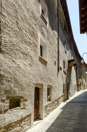 old houses on bending street in medieval village of Bard  Italy