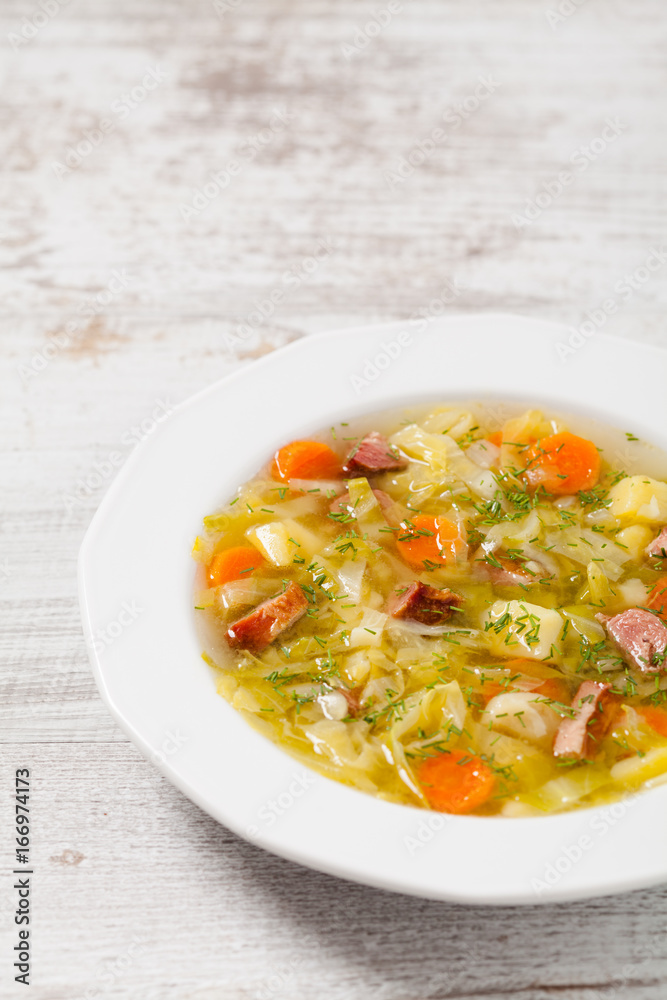 Homemade cabbage soup, cooked on smoked ribs.